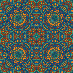 Seamless doodle pattern. Colorful background. Ethnic motives. Zentangl. Orange, green and blue