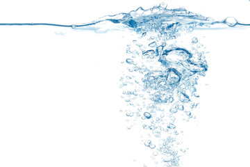 Water surface with stream of bubbles emerging