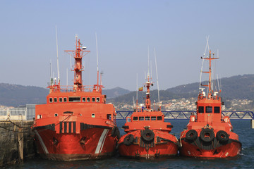 Fototapeta premium three tugboats in the port