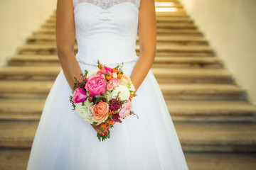Lovely wedding bouquet in bride's hands