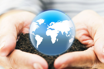 woman hands holding the earth . protection planet mother earth concept:reduce carbon dioxide...