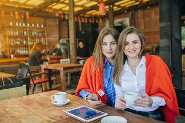 two girls in a cafe