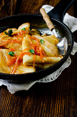 Crepe suzette, traditional french pancakes with orange syrup