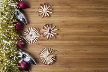Obraz na płótnie Canvas Christmas decorations on wooden background with plenty of space