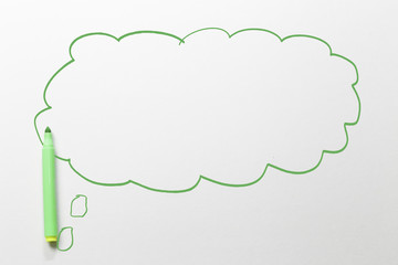 green marker in bubble on white background