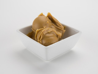 Peanut Butter in Bowl on White