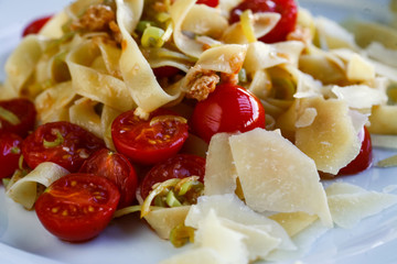 Tagliatelle pasta with cherry tomatoes and cheese 