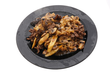 Veal with black and white mushrooms and bamboo shoots