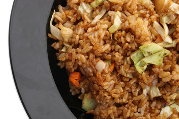 Chinese food. Rice with vegetables in soya sauce