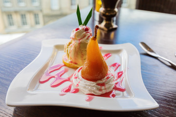 dessert with poached pear and ice cream