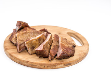 Smoked ribs on the wooden board