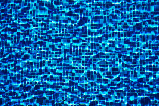 Blue swimming pool tile background