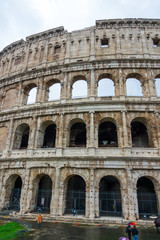 Fototapeta premium The famous Colosseum in Rome - Colisseo - a huge tourist attraction in the city