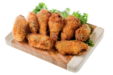 Fried chicken legs isolated on white