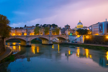 Fototapeta na wymiar Amazing evening view over River Tiber and its bridges in Rome