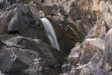 Crows Nest Falls and creek in Crows Nest Falls National Park, Oxenford.