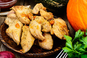 Roasted turkey breast with herbs, pumpkin soup and parsley on Th