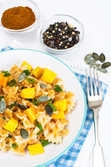 Farfalle with pumpkin and carrot sauce