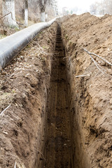 trench excavator dug for water pipe