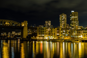 Vancouver cityscape at night skyscrapers and bridge
