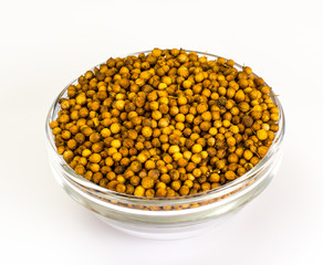 Coriander in a Glass Bowl on  White