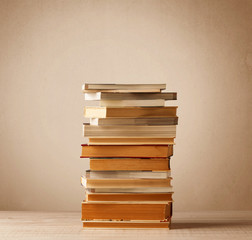 A stack of books with vintage background