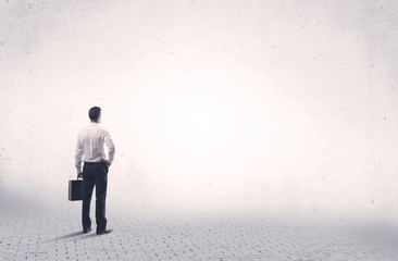 Elegant person standing with his back