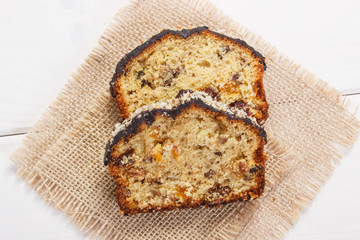 Fresh baked fruitcake on white boards