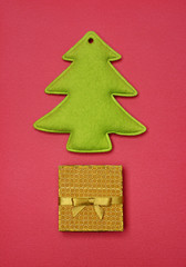 Christmas background with felt Christmas tree and gift box