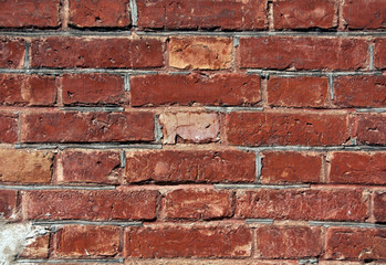 Fototapeta premium Weathered red brick wall texture.