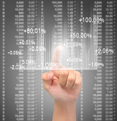 businessman with financial symbols coming from hand