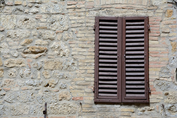 Brown window shutters