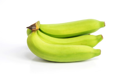 Green banana on white background.