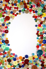 frame of colorful buttons isolated on white background.vertical 