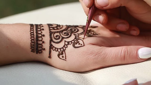 henna on a female hand