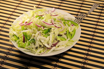 Chinese cabbage salad with green pepper and onion 