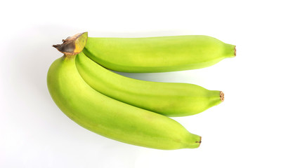 Green banana on white background. © supaleka