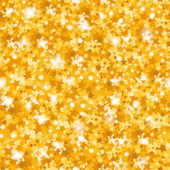 Bright golden background. Golden shiny stars. Christmas background, texture.