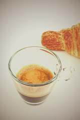 Espresso coffee and croissant with copy space