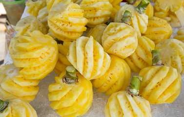 Chilled pineapple, ice box, in marketing, Thailand.