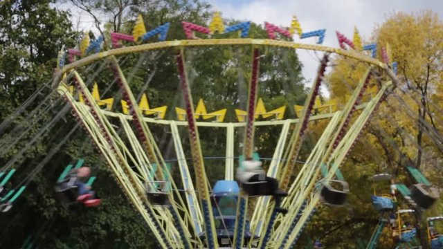 Children carousel in the park zone