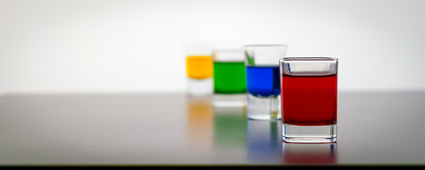 Shot Glasses With Colored Drinks