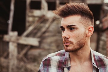 Attractive guy in a old house
