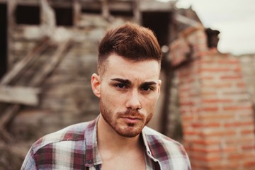 Attractive guy in a old house
