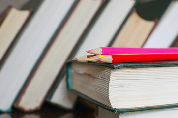 Coloring Pencils And Books stacked