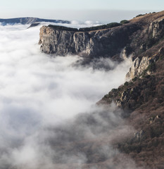 Mountain hills shrouded in low clouds, top of Demerdji in Crimea