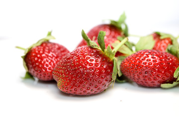 Strawberry fruits in white background.