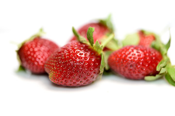 Strawberry fruits in white background.