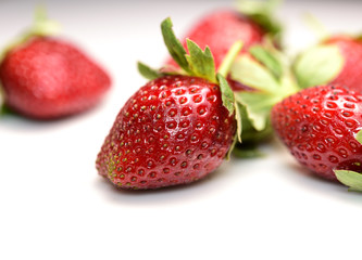 Strawberry fruits in white background.