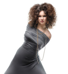 Naklejka premium Brunette girl with a curly hairstyle and carnivore look with her hands tied